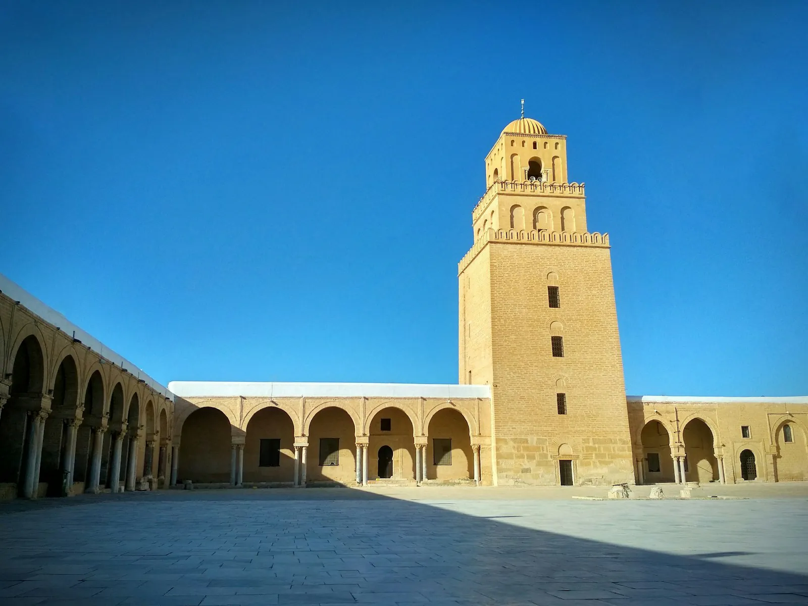 The square minaret and arcaded courtyard of the Great Mosque of Kairouan