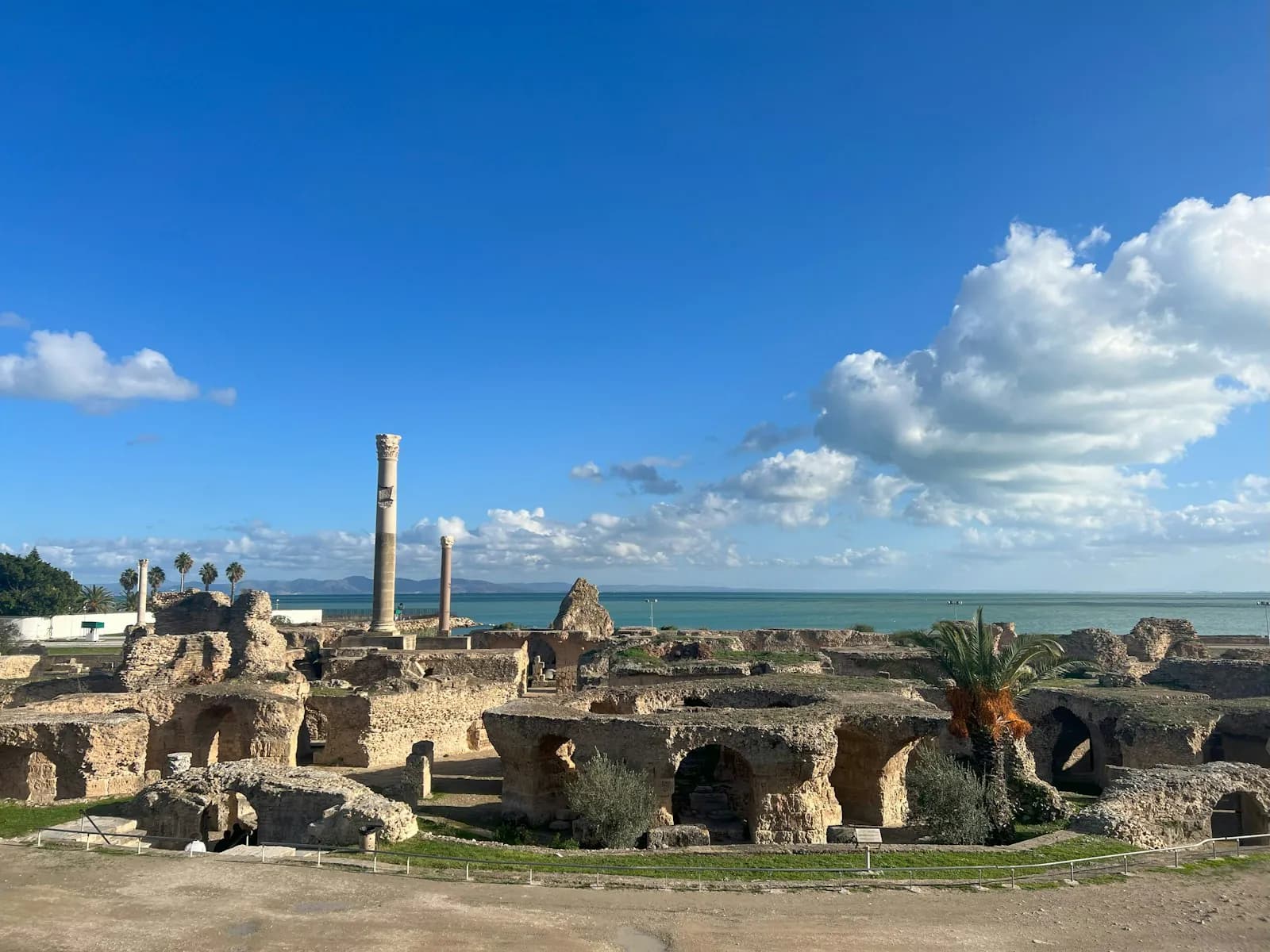 The ruins of the Antonine Baths in Carthage with the Mediterranean behind