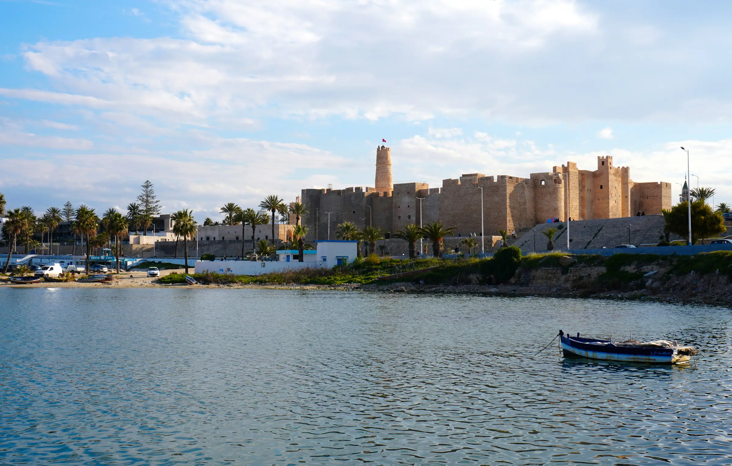 The ribat of Monastir and its tower beside a calm bay