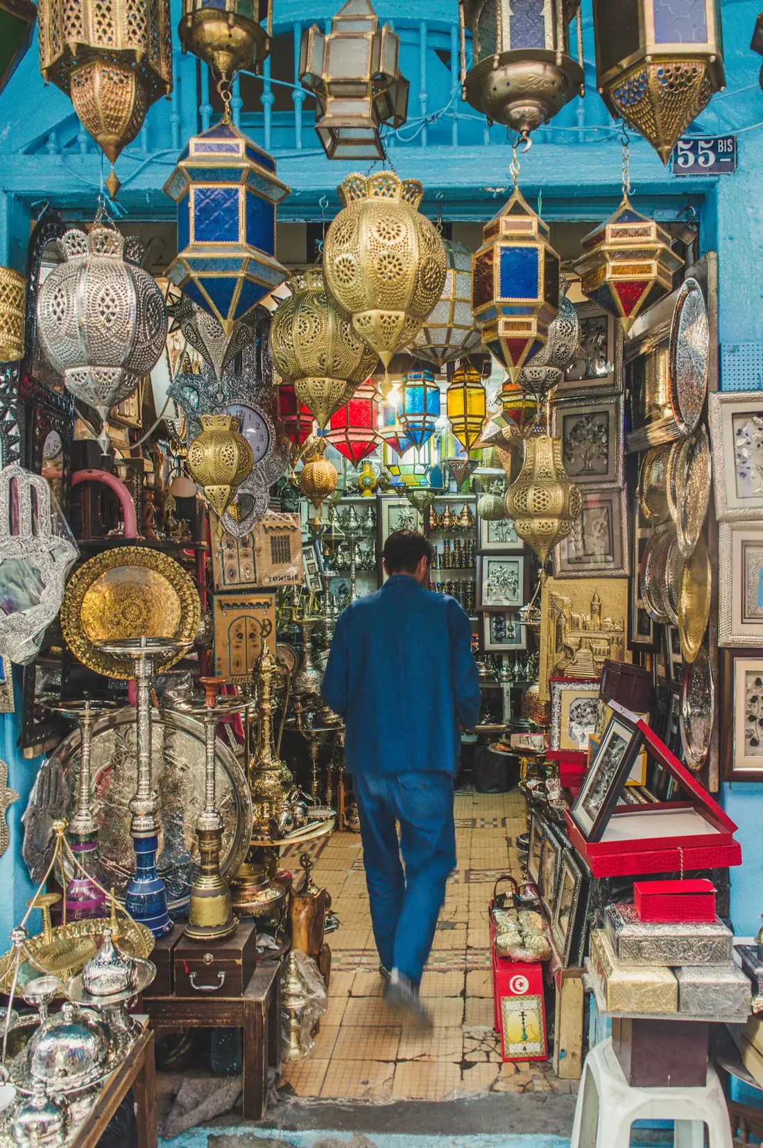 A lamp shop in the souks of the Tunis medina, hung with brass lanterns